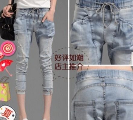 勤德牛仔裤产品图片 勤德牛仔裤店铺装修图片
